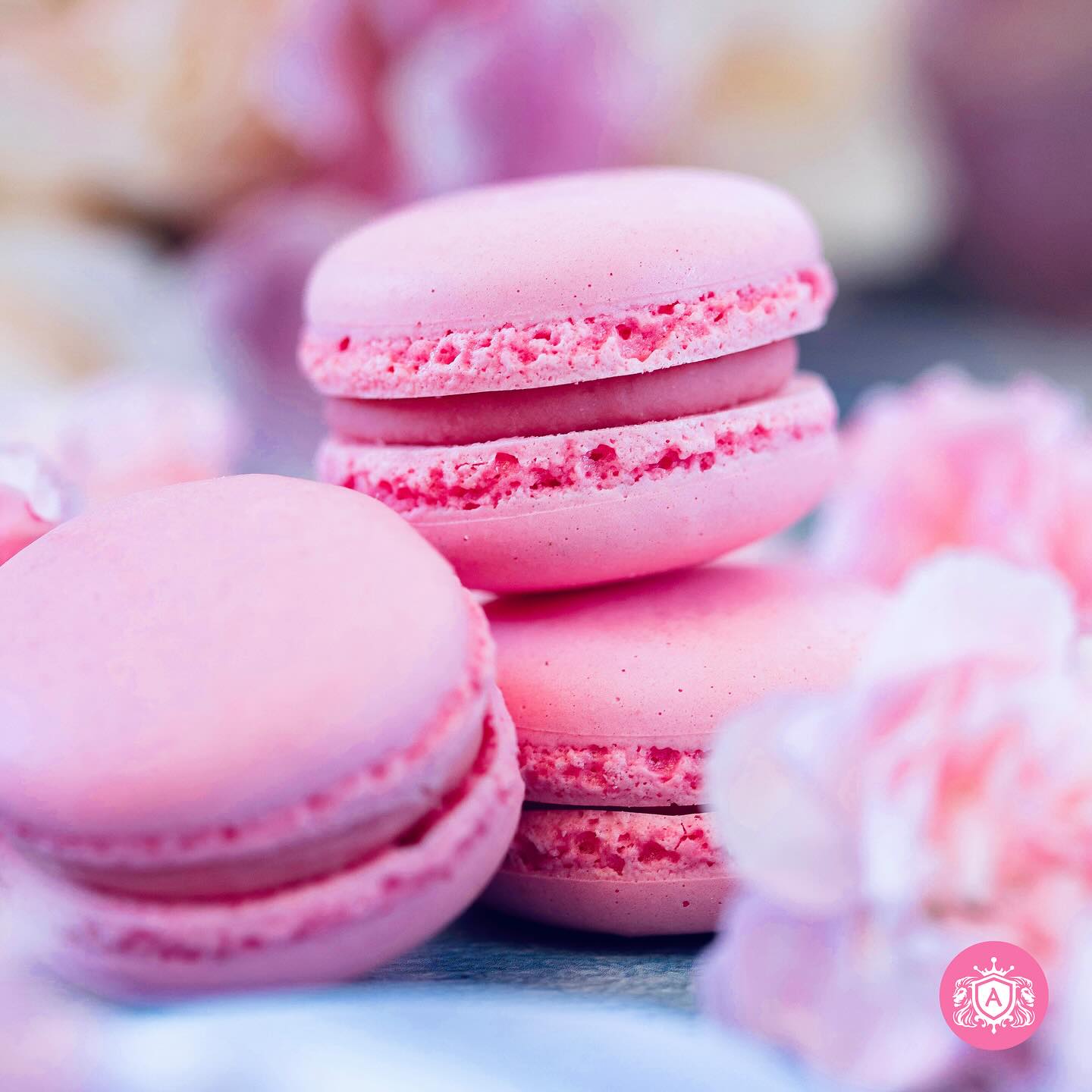 Experience the taste of our Royal Raspberry Macarons. Delicate shells with a luscious raspberry filling, crafted for a truly regal delight in every bite.